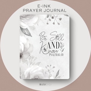 Könnte beinhalten: Ein weißes und graues E-Ink-Gebetsjournal mit einem floralen Design und dem Text "Be Still And Know PSALM 46:10".