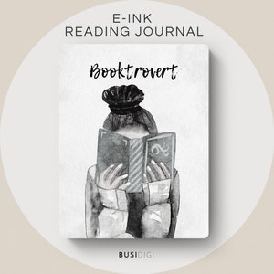 May include: Black and white illustration of a person reading a book with the text "Booktrovert" above the person. The text "E-INK READING JOURNAL" is at the top of the image and the text "BUSIDIGI" is at the bottom of the image.