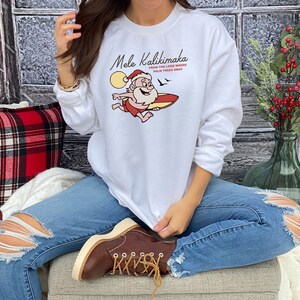Mele Kalikimaka Hawaii Sweatshirt, Hawaiian Christmas Sweater, Surfing Santa Shirt, Happy New Year, Xmas Gift, Family Holiday Sweatshirt image 3