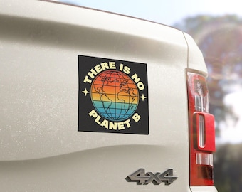 May include: A white truck with a black and yellow sticker that says "There is no planet B" with a retro-style image of the Earth.