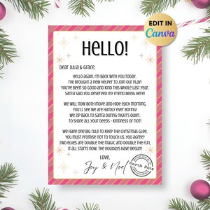 Peut inclure: Une lettre de Noël festive avec une bordure rose et dorée, adressée à Julia & Grace. La lettre comprend le texte "HELLO!" et un message de Joy & Noel, avec un tampon du Pôle Nord. L'image est ornée de décorations et de verdure de Noël.