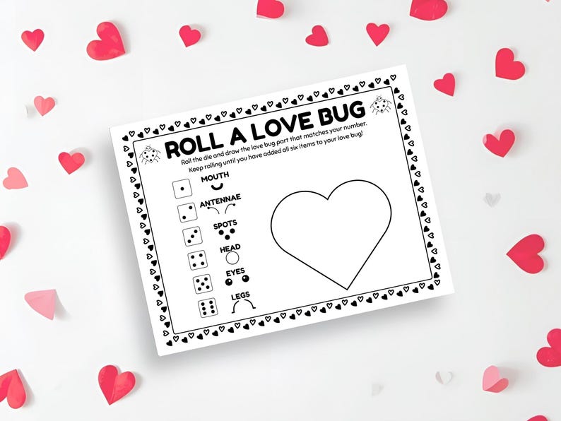 May include: A white paper with the text "ROLL A LOVE BUG" and a heart-shaped drawing area. The game includes dice and instructions for drawing a love bug. Red heart-shaped confetti is scattered around the paper.