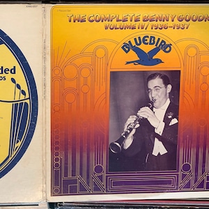 May include: A vintage vinyl record album cover featuring a bluebird logo and the text "Bluebird Electrically Recorded Records". The album is titled "The Complete Benny Goodman Volume IV/1936-1937".