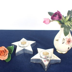 Set of 2 candlesticks star shape silver-plated verm. Alpacca/nickel silver 10,5 cm