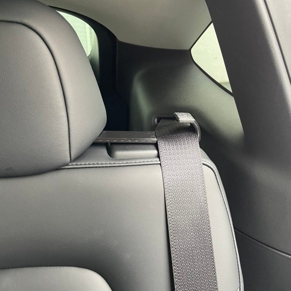 Tesla Model Y belt guide for rear seats