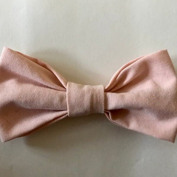 pale pink bow tie and suspenders
