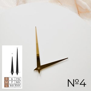 May include: Gold-colored clock hands with a triangular design, alongside a black and white size chart. The hands are labeled "No. 4" and are set against a white background. The size chart indicates lengths from 5 to 13.5 inches.