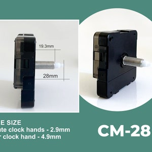 May include: Black clock movement with a silver shaft, measuring 4.8 cm wide and 2.8 cm tall. The text "CM-28" is visible below the movement.