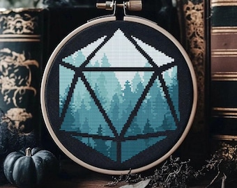May include: A cross-stitch embroidery hoop with a blue and green forest scene inside a black and white geometric shape, resembling a twenty-sided die.