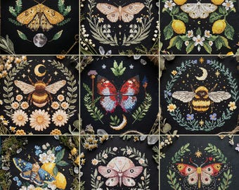 May include: Nine cross-stitch designs on black fabric, each featuring a central insect or creature. The designs include moths, butterflies, and bees, surrounded by floral wreaths, moons, and stars. The color palette includes yellows, blues, and reds.