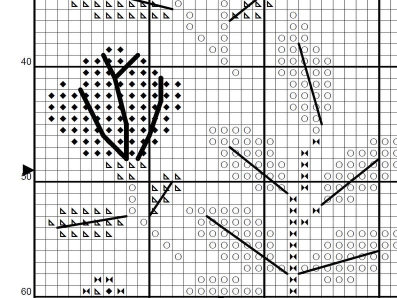 May include: A cross-stitch pattern chart with a floral design. The chart features a grid with various symbols, including diamonds, triangles, and circles, forming a detailed illustration. The design includes a central flower with a stem and leaves.