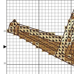 Puede incluir: Un patr&oacute;n de punto de cruz con un dise&ntilde;o geom&eacute;trico en tonos marrones y beige. El patr&oacute;n se establece sobre un fondo de cuadr&iacute;cula, con el dise&ntilde;o ocupando una parte significativa de la imagen.