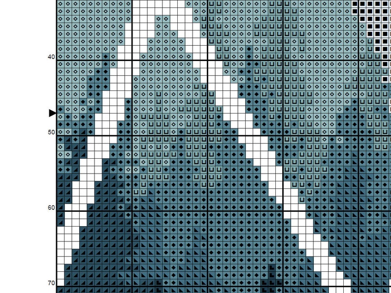May include: A cross stitch pattern featuring a blue and white abstract design. The pattern is made up of small squares, each with a different shade of blue or white.