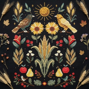 Puede incluir: Diseño de punto de cruz con dos pájaros, girasoles, maíz y elementos otoñales sobre fondo negro. El diseño incluye un sol, manzanas, peras y espigas de trigo, creando un tema de cosecha.