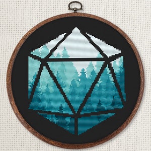 May include: A black and white cross-stitch embroidery of a forest scene inside a geometric shape resembling a twenty-sided die. The forest is depicted in shades of blue and green.