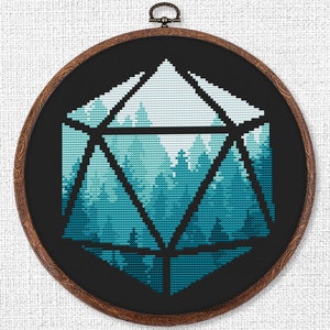 May include: A black and white cross-stitch embroidery of a forest scene inside a geometric shape resembling a twenty-sided die. The forest is depicted in shades of blue and green.