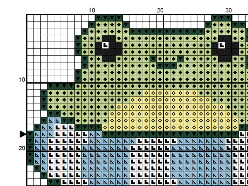May include: A cross-stitch pattern featuring a frog with a light green head, dark green outlines, and black eyes. The frog has a yellow belly and is holding a light blue and white striped object. The design is set on a white grid with numbered axes.