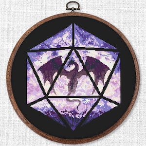 May include: A cross-stitch design featuring a purple dragon within a geometric shape, set against a black background. The artwork is framed in a round wooden hoop, showcasing a fantasy theme.