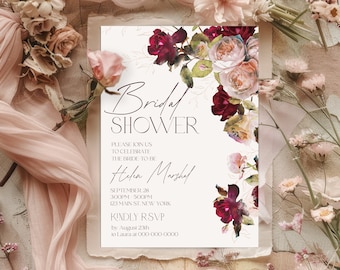 May include: A white bridal shower invitation with a floral design featuring burgundy and pink roses. The text reads "Bridal Shower", "Please join us to celebrate the bride-to-be Helen Marshal", "September 28, 3:00PM-5:00PM, 123 Main St. New York", "Kindly RSVP by August 23rd to Laura at 000-000-0000".