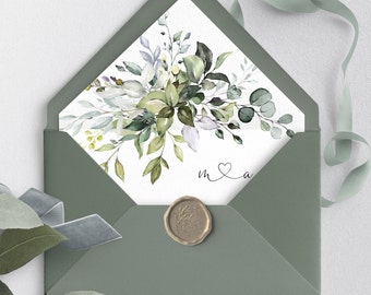 Könnte beinhalten: Ein grüner Umschlag mit einer weißen Karte darin. Die Karte zeigt eine Aquarell-Illustration von grünen und weißen Blättern und den Text "m & a". Ein Wachssiegel mit einem Blattdesign befindet sich auf dem Umschlag.