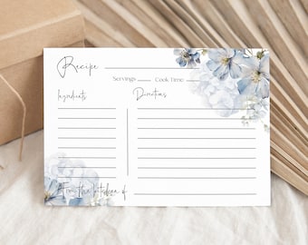 May include: A printable recipe card with a blue floral design. The card has sections for ingredients, directions, servings, and cook time. The text at the bottom reads "From the kitchen of".