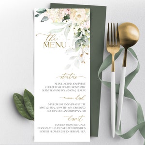 May include: A wedding menu with a floral design. The menu includes starters, main dish, and dessert options. The text on the menu reads: "The Menu", "Starters", "Main Dish", and "Dessert".