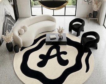 Alfombra moderna abstracta de lana tejida a mano, alfombra redonda negra y marfil, alfombra hecha a mano a medida, alfombra minimalista de lujo para sala de estar.