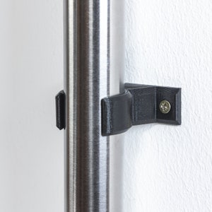 Wall mount vacuum cleaner tube and wall mount floor nozzle for Miele vacuum cleaner holder
