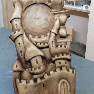Wood carving the castle of Time. A beautiful wall clock for kids room, bedroom or where ever you like. Made with love from linden&#39;s wood