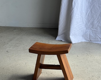 Small stool with curved seat in Asian teak, H36, W21