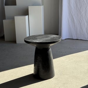 Side table in solid black mango wood (monoxylous) with minimalist conical base H47 D44