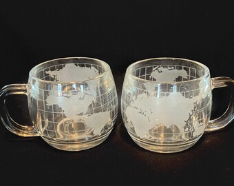 Vintage Set of 2 NESTLE 1970's World Globe Clear Glass Mugs