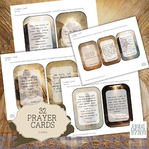 May include: A collection of 32 prayer cards in two sizes, featuring inspirational Bible verses. Each card has a unique design with text and a decorative border. The cards are printed on white paper and are designed for spiritual reflection.
