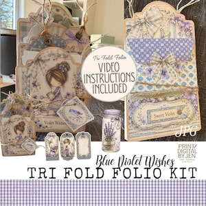 Könnte beinhalten: Ein Blue Violet Wishes Tri-Fold-Folio-Set mit Papierbastel-Elementen, Blumen- und Figurenillustrationen, Anhängern, einem Glas-Motiv und Taschen. Text: Tri Fold Folio VIDEO INSTRUCTIONS INCLUDED, Sweet Violet und Print Digital by Jen.