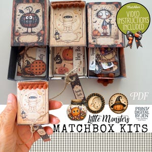 May include: Three rectangular matchbox kits featuring Halloween-themed illustrations of a pumpkin creature, a mummy, and a child with a sword. Each box includes decorative trim, internal paper ephemera, and a tag labeled Spooky Spells.