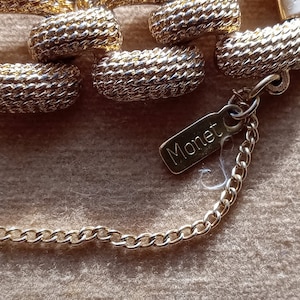 Lovely Vintage Signed Monet Goldtone Textured Link Bracelet 7&quot; with safety chain