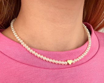 Parelketting met harthanger en 18k gouden sluiting