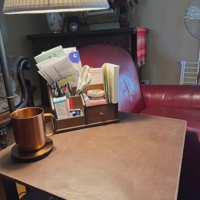Tan leather desk pad on a home office desk