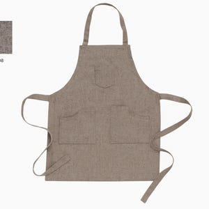 May include: A neutral-toned apron with a pocket on the chest and two lower pockets. The apron has long ties and a neck strap. The fabric swatch in the upper left corner is labeled "PH - 08".
