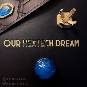 May include: A blue orb with a textured surface sits on a black background. The words "OUR HEXTECH DREAM" are written in gold letters. A gold metal stand with a geometric design is in the upper right corner of the image. The text "t @aurumnexus @aurum_nexus" is in the lower left corner of the image.