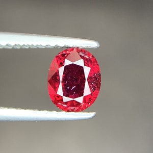 1.15 Carats, Ruby Loose Gemstone, Natural Ruby Cut Stone, Sparkling Pinkish Red Color, Faceted Oval Shape, Jewelry Size Pinkish Ruby.