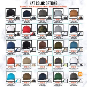May include: A grid of 25 six-panel mid-profile trucker hats in various color combinations, including solid black, navy, charcoal, grey, caramel, white, red, camo, and multi-colored options. Each hat is shown with a snapback closure.