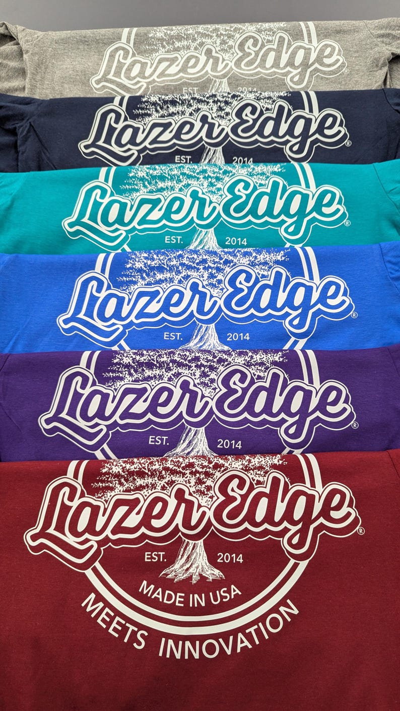 May include: A set of three ceramic mugs with a speckled, matte finish in cream, light grey, and dark grey. Each mug has a minimalist design, ideal for tea or coffee.