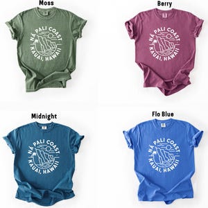 four different colored shirts with different logos on them