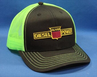 Oliver Diesel Power Tractor Logo On A Black And Charcoal Mesh Trucker Hat Snapback