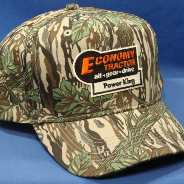 Economy Power King Tractor Logo On A Camouflage Solid Hat Snapback Trucker