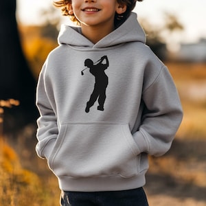 May include: A gray hooded sweatshirt with a black silhouette of a golfer swinging a club on the front.