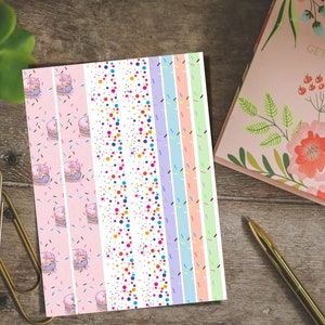 May include: A set of 10 colourful washi tape rolls with different patterns, including donuts, sprinkles and polka dots. The washi tape is perfect for adding a touch of fun to your planner, journal or scrapbook.