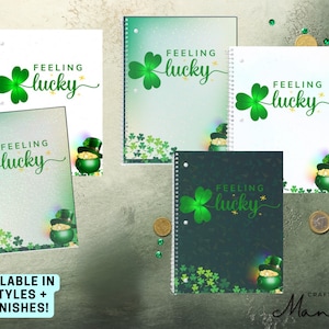 May include: Five different designs of spiral notebooks with a green shamrock and gold pot of gold design. The notebooks have the text "Feeling Lucky" on them.