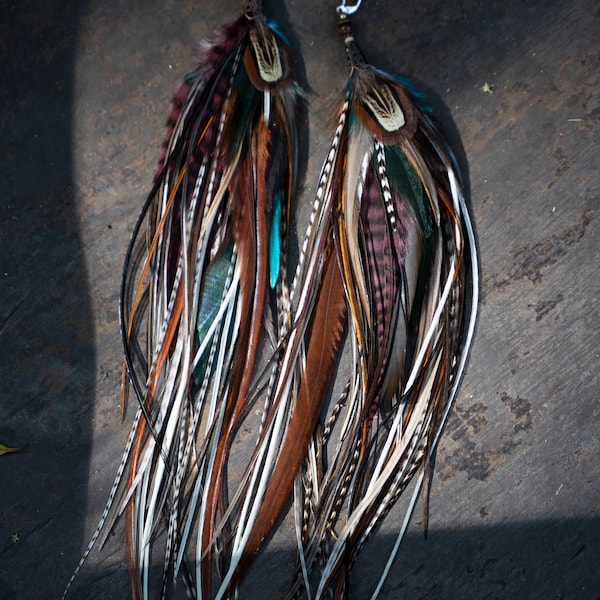 Long feather earrings. Natural feather earrings with silver hooks. Hypoallergenic silver earrings with feathers in brown and purple colors.